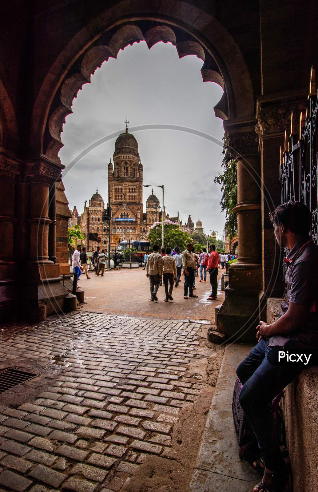 A Pedestrian Looking At Greater Bombay Municipal Corporation (BMC) Building