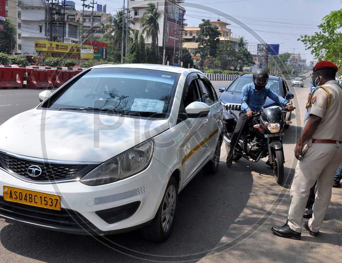 Police Personnel Question Commuters Who Defied Curfew During A 21-Day Nationwide Lockdown, In The Wake Of Coronavirus Pandemic, In Guwahati  On  Wednesday, March 25, 2020