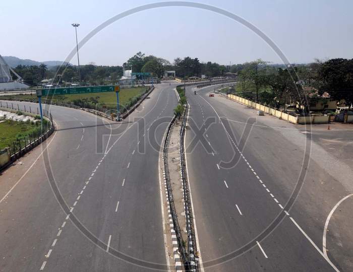 A Deserted Road On The First Day Of 21-Day Complete Lockdown In The Wake Of The Corona Virus Pandemic In Guwahati On Wednesday, 25 March 2020.