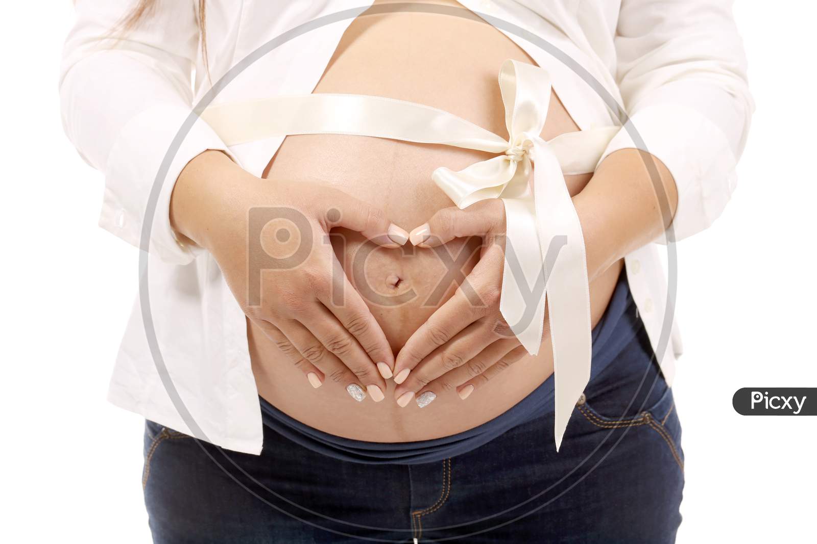 Beautiful Pregnant Woman Belly. Isolated On A White Background.