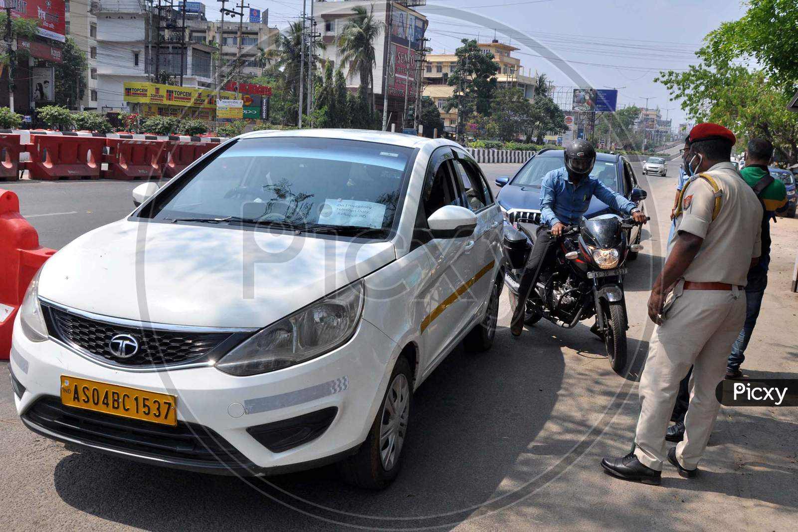 Police Personnel Question Commuters Who Defied Curfew During A 21-Day Nationwide Lockdown, In The Wake Of Coronavirus Pandemic, In Guwahati  On  Wednesday, March 25, 2020