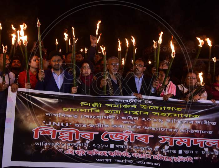 Activists of All Assam Students Union (AASU) along with 30 Ethnic Organisation taking out a torch light rally protest against Citizenship Amendment Act (CAA) in Guwahati