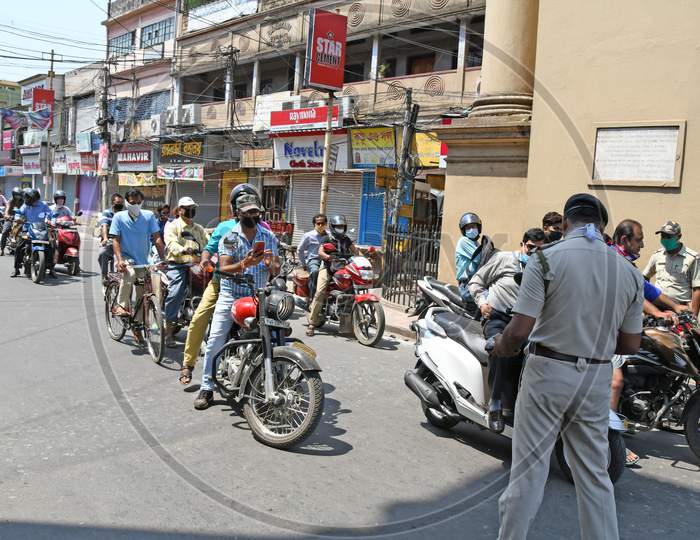Police operation against lockdown rule breakers. Complete Safety Restrictions - Lockdown to prevent Coronavirus COVID 19 At Burdwan Town, Purba Bardhaman, West Bengal, India.