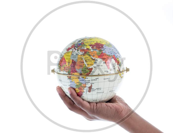 Globe On Hand Isolated On White Background