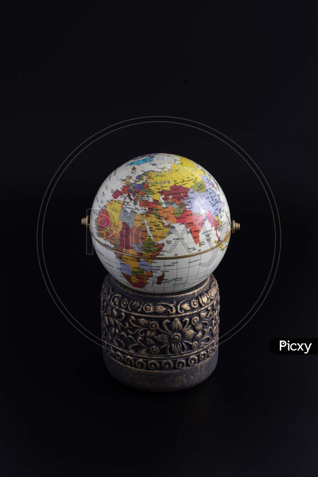 Globe And Vase Isolated On Black Background