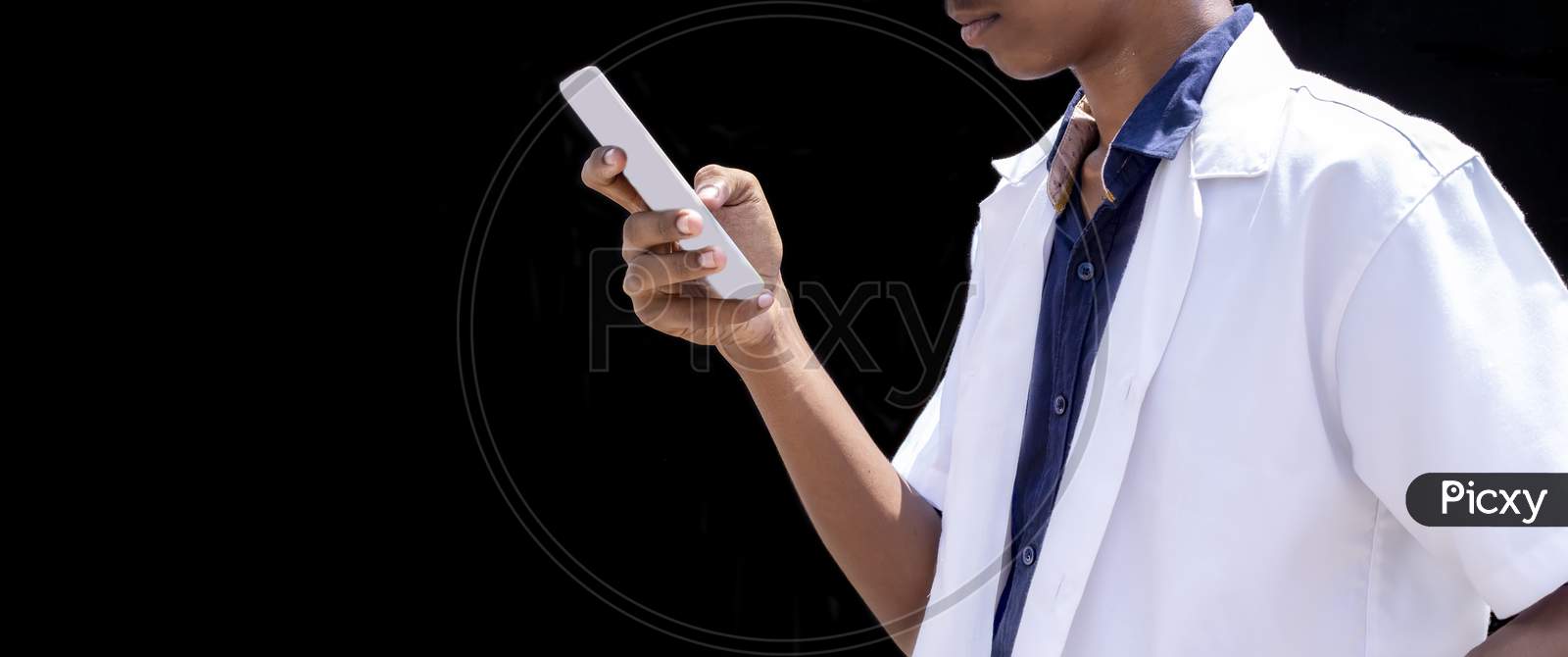 Doctor Using Mobile Smart Phone Isolated On Black Backgrounds