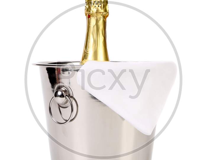 Bottle Of Champagne In Cooler. Isolated On A White Background.