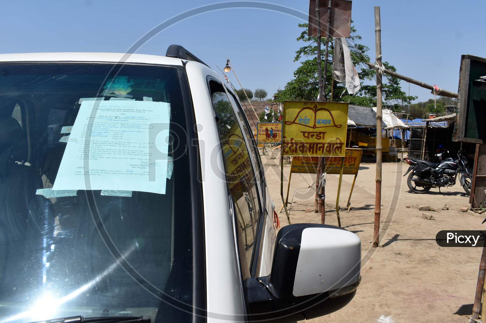 A Car With a Permission letter Tagged To glass Of a Car During COVID-19 0r Corona Virus Lockdown In India , Prayagraj