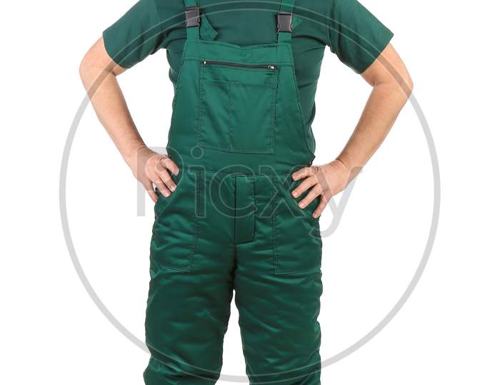 Worker In Green Overalls. Isolated On A White Background.
