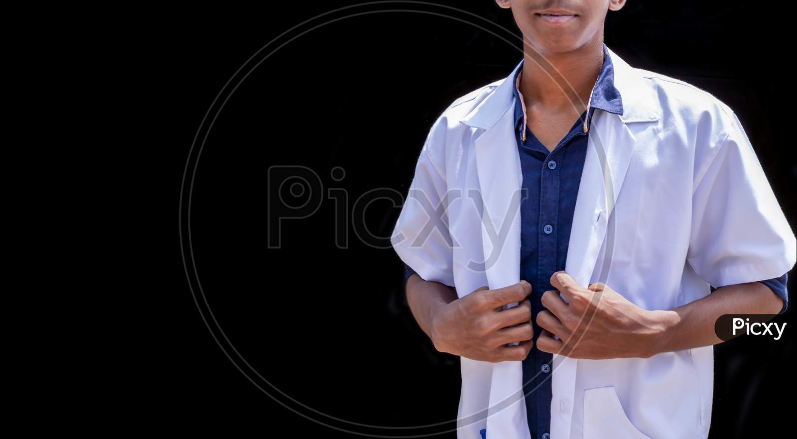Cropped Shot Of An Unrecognizable Male Doctor Standing With Hands Holding A White Coat