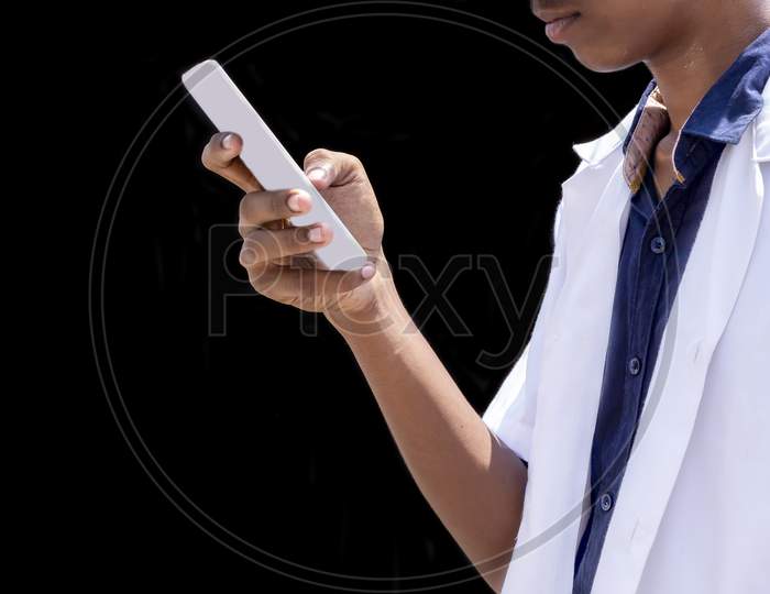Doctor Using Mobile Smart Phone Isolated On Black Backgrounds