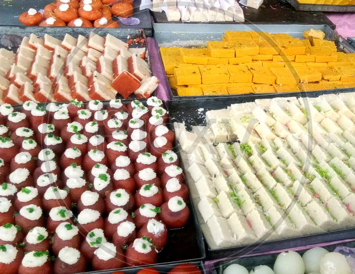 Traditional Indian Sweets Sold On Street Vending Stalls