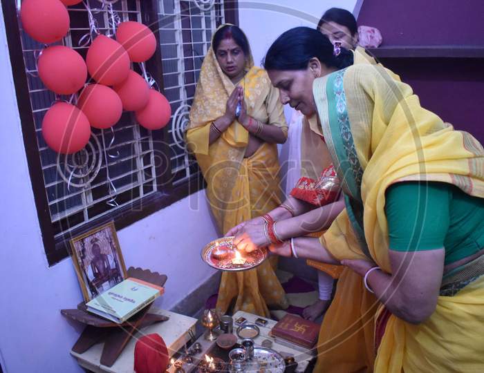 Indian Woman Performing Pooja In an House With Dias Lighten After PM Narendra Modi Called For an 9 Min Lighting Of Candles And Dias To Fight Against Corona Virus Or COVID-19 Outbreak in India, Prayagraj
