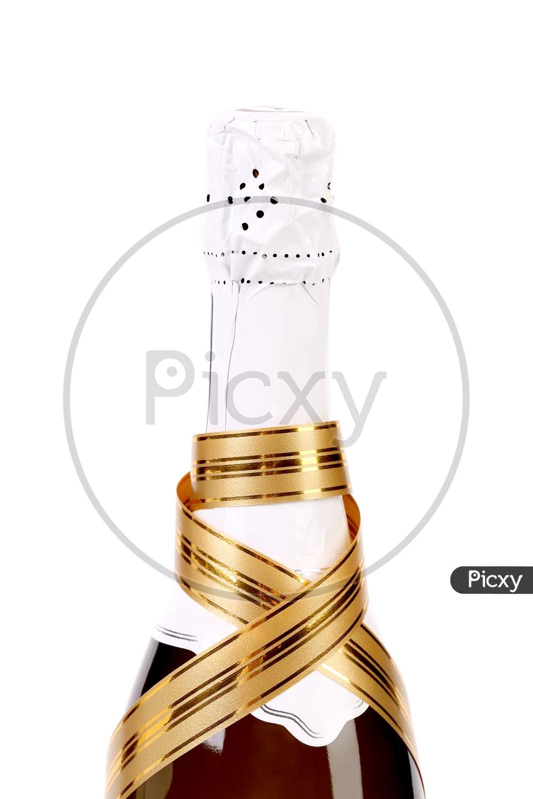 Bottle Champagne With Gold Ribbon. Isolated On A White Background.