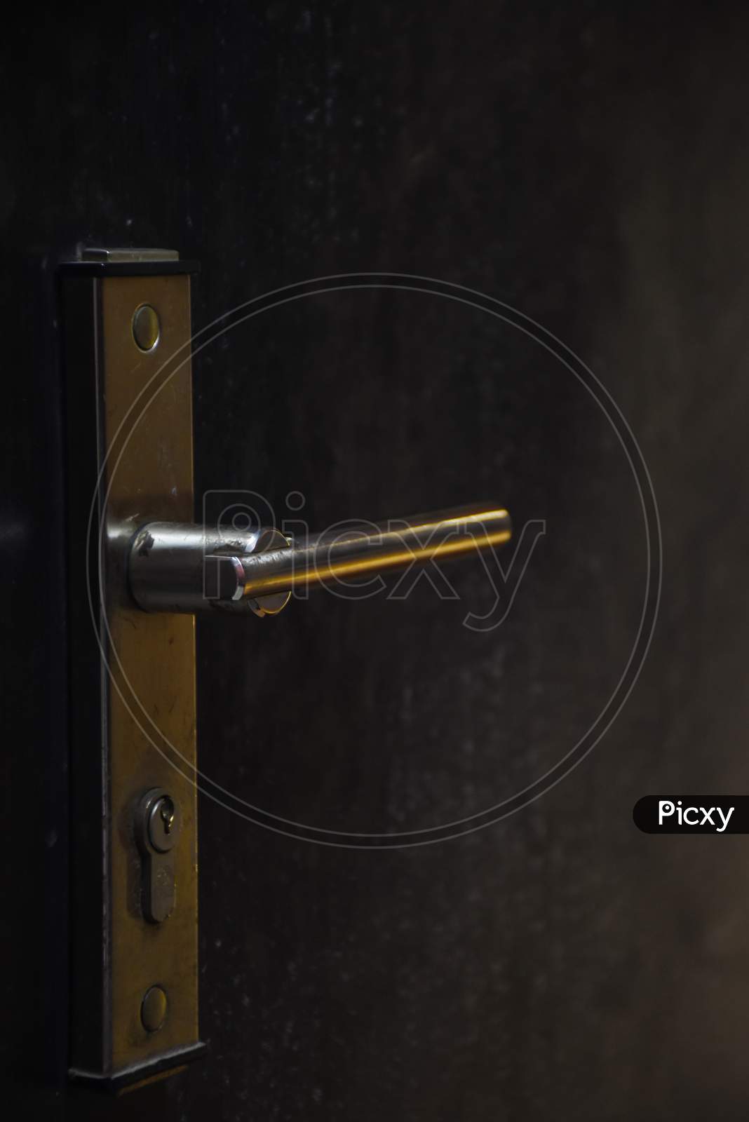 door handle on a black background
