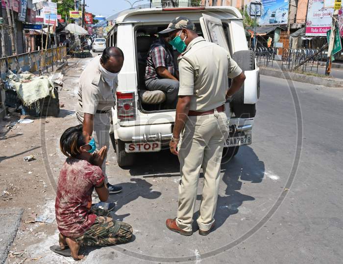 Police operation against lockdown rule breakers. Complete Safety Restrictions - Lockdown to prevent Coronavirus COVID-19 At Burdwan Town, Purba Bardhaman, West Bengal, India.