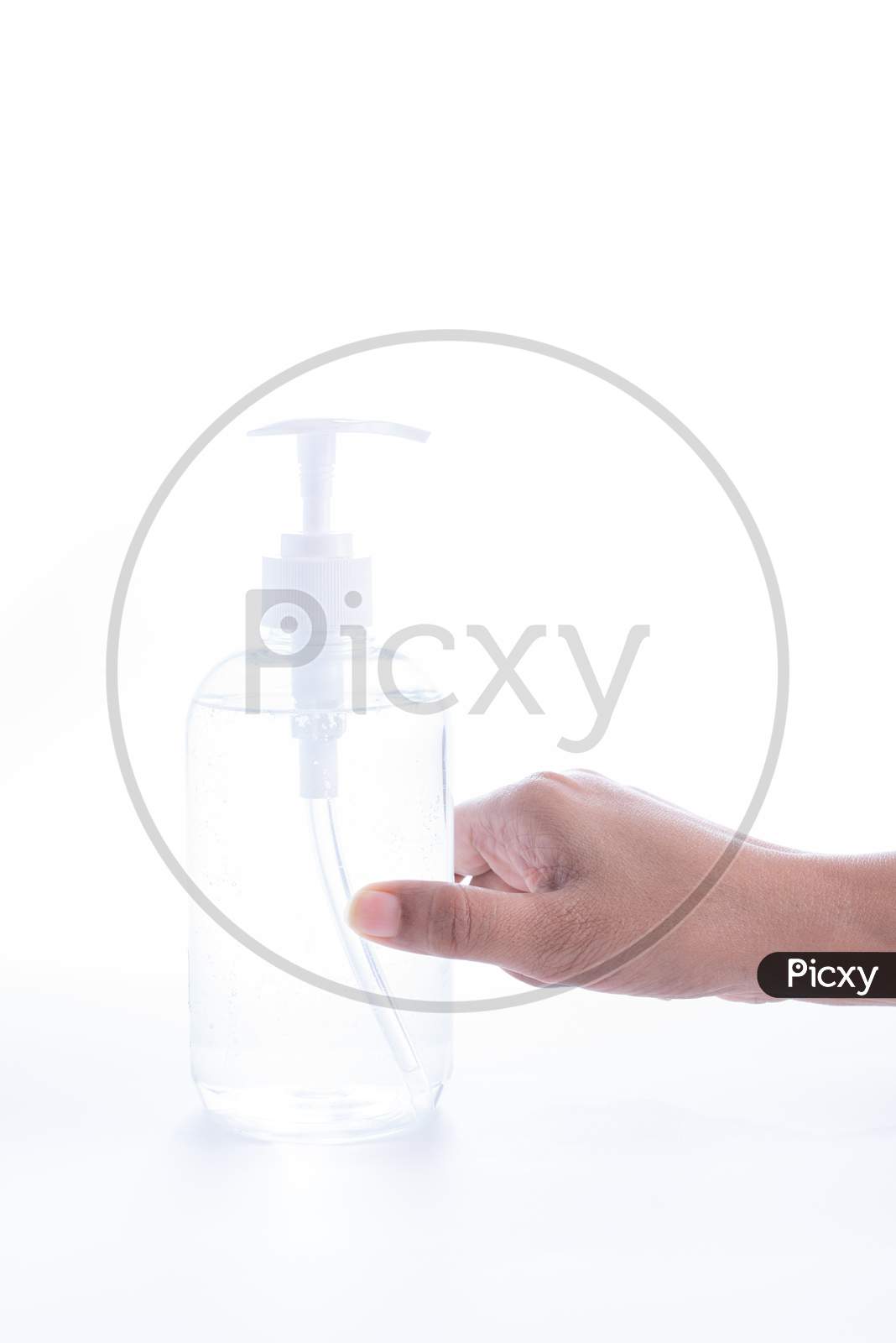 Hand Sanitizer Alcohol Gel Rub Clean Hands Hygiene Prevention Of Coronavirus Virus Outbreak. Girl Using Bottle Of Antibacterial Sanitiser Soap.