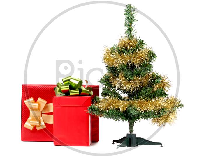 Christmas Tree With Present Box. Isolated On A White Background.