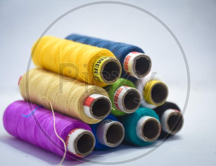 spools of thread isolated on white background