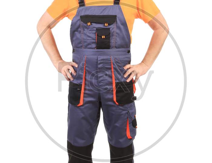 Happy Worker Wearing Overalls. Isolated On A White Background.