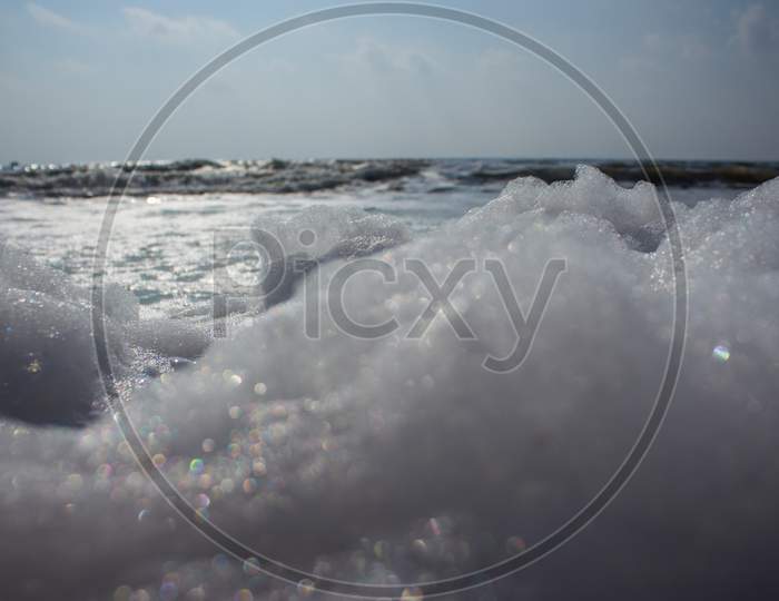 India: Toxin-Laced Bubbles Cause Pollution Hazard On Indian Beach. Frothy And Toxic Bubbles Cover One Of India’S Most Famous Beaches.