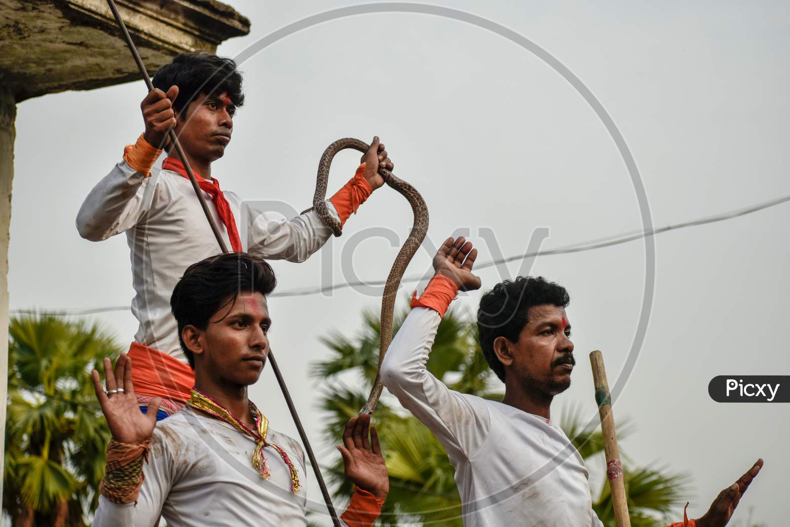 A group of the young man performing Indian folk martial dance also known as Raibenshe