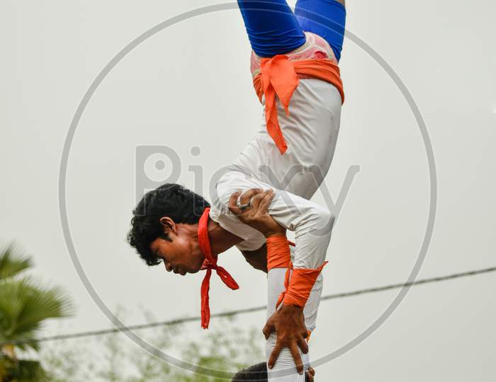 A group of the young man performing Indian folk martial dance also known as Raibenshe