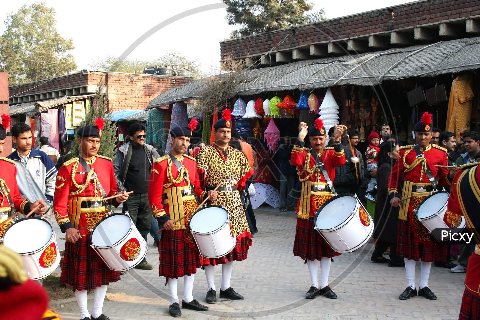 SSB parade playing drums and bagpipes at Dilli Haat