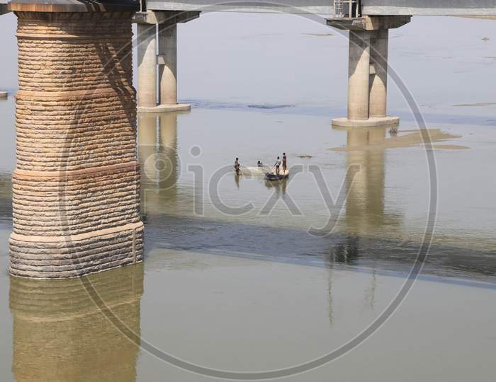 Fishermen Fishing In The River Ganga During A 21-Day Nationwide Lockdown To Slow The Spreading Of Coronavirus Disease (Covid-19) In Prayagraj, April 9, 2020