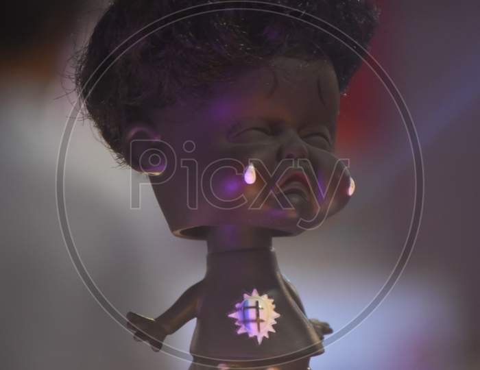 little doll with blur background
