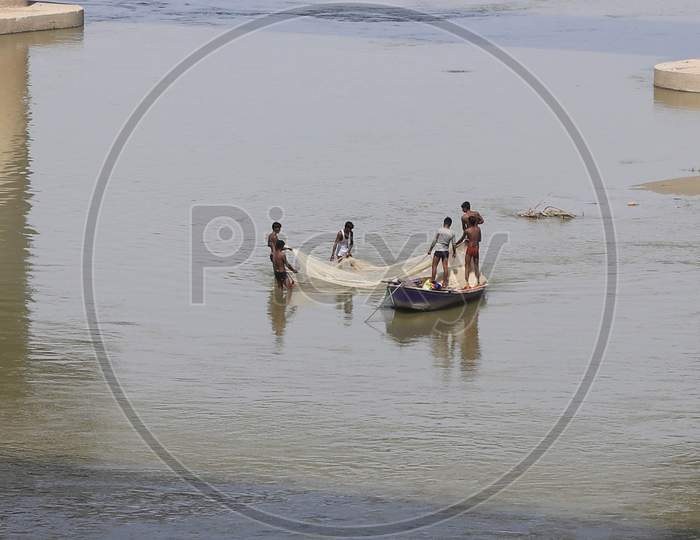 Fishermen Fishing In The River Ganga During A 21-Day Nationwide Lockdown To Slow The Spreading Of Coronavirus Disease (Covid-19) In Prayagraj, April 9, 2020
