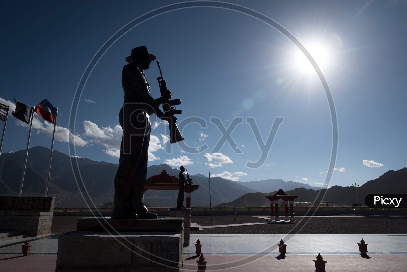 Leh, Kashmir, India - September 20 2019: Silhouetted statue of a soldier at the high altitude war memorial in Leh on bright summer day
