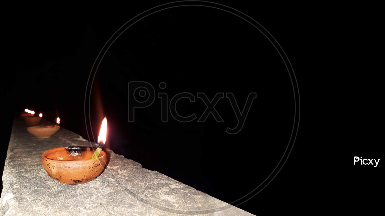 lighting diya with mustard oil