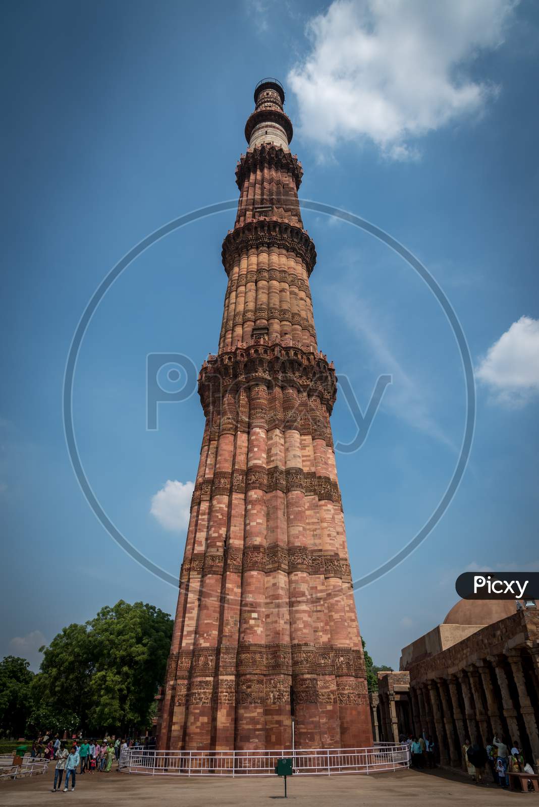 Close up of Qutub Minar tower's balcony against blue sky, New Delhi, India