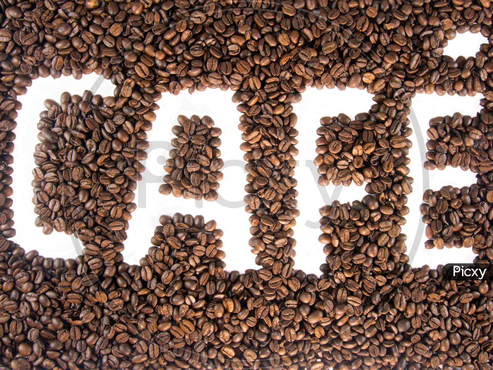 coffee written embossed with coffee beans
