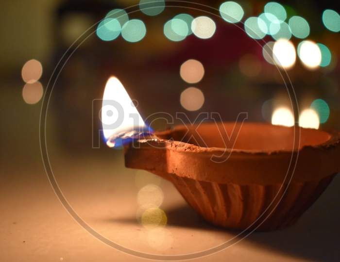 Diwali diya or lamp with bokeh effect