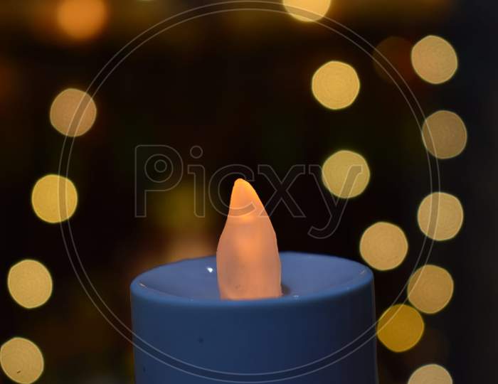 Electric lamp with bokeh effect at background