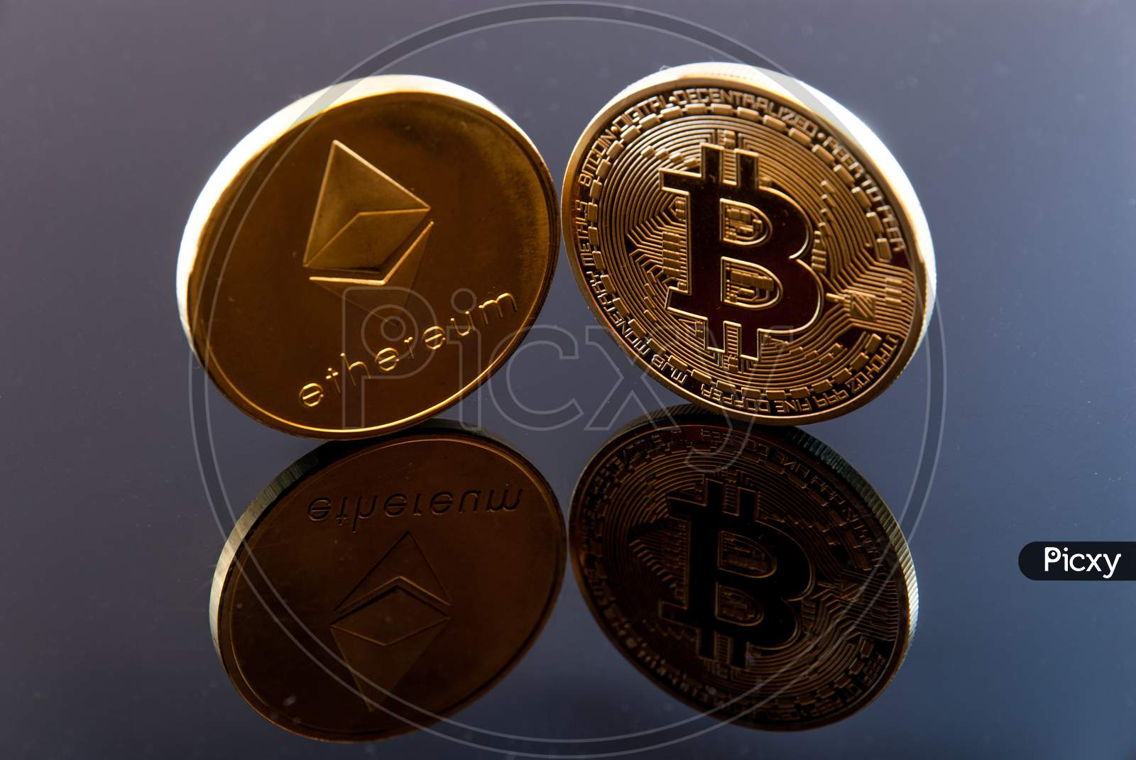 cryptocurrencies concept coins on black with reflections concept abstract