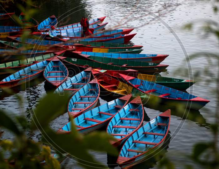 Colorful Wooden Boats Parked At Phewa Lake, Pokhara, Nepal