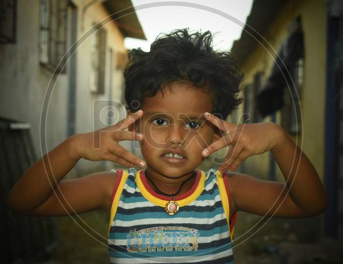 A  child poses for a photo