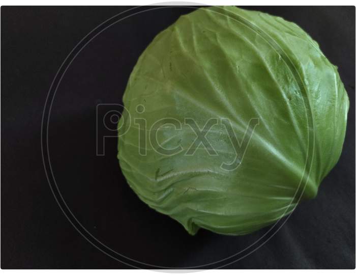Closeup of Indian cabbage on black background.