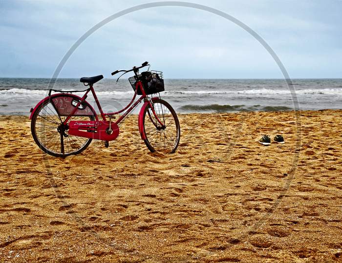 cycle at sea beach at puri odisha india