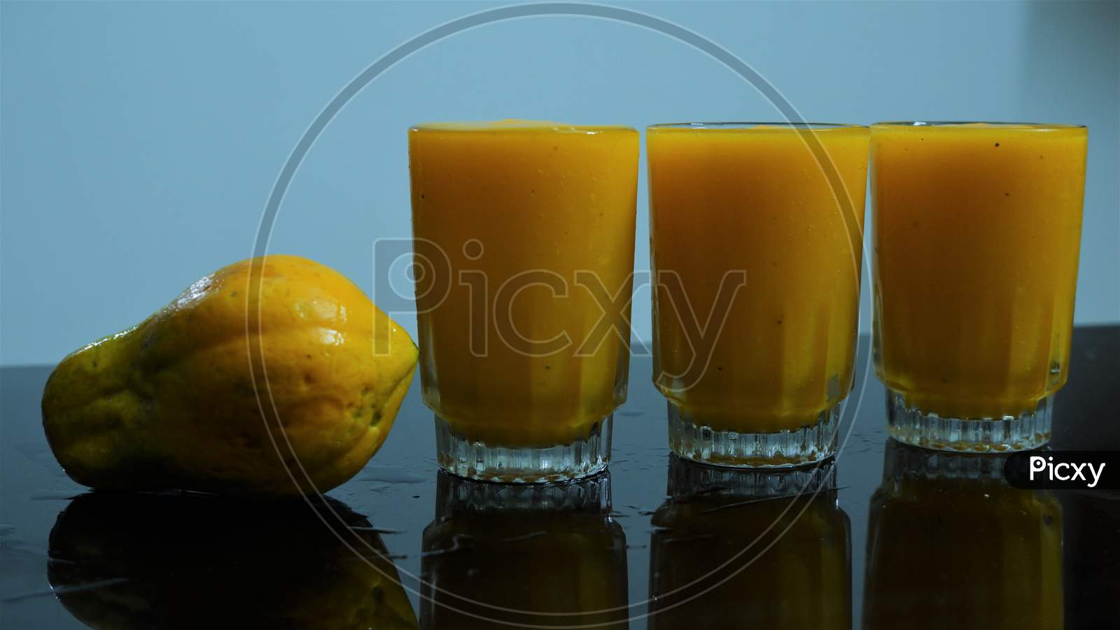 Papaya juice on the glass with papaya