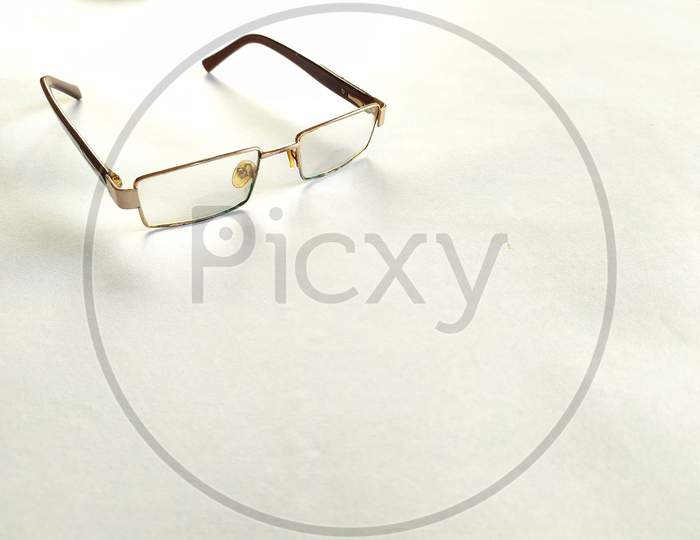 Modern eyeglasses on white background.