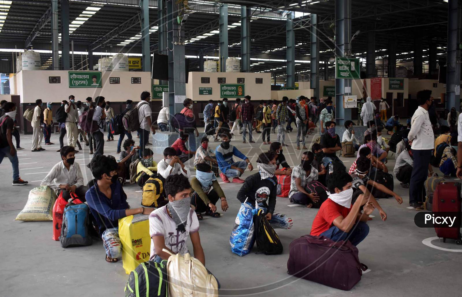 Migrant Laborers Rest After Arriving From Gujarat State On A Special Train At Prayagraj Railway Station During Nationwide Lockdown Amidst Coronavirus Or Covid- 19 Pandemic, Prayagraj, May 10, 2020