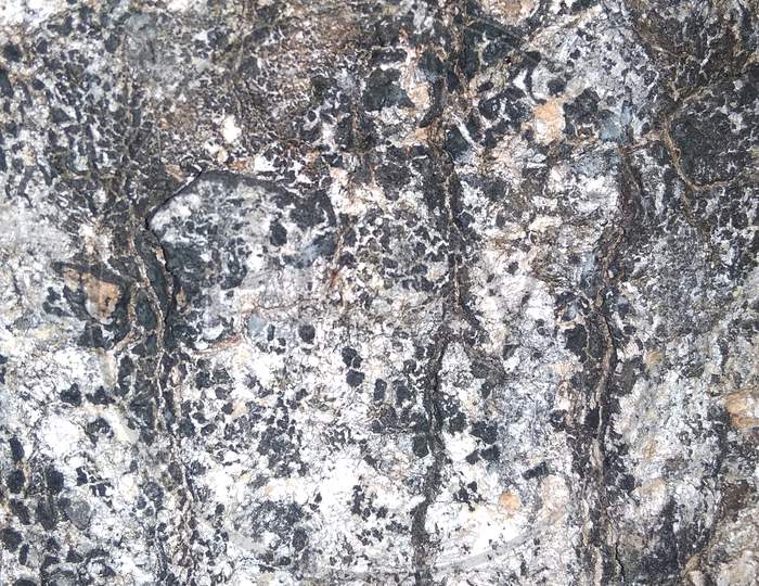 Brown rock crack cement Texture surface background wallpaper