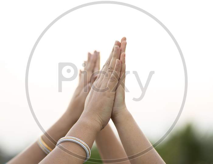 Child And Mother Hand Making High Five