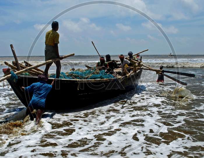 fisherman going to sea at mandermoni west bengal india