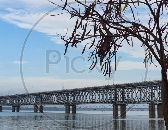 Beautiful image of Asia's longest rail cum raod bridge across the calm Godavari  river in Rajahmundry