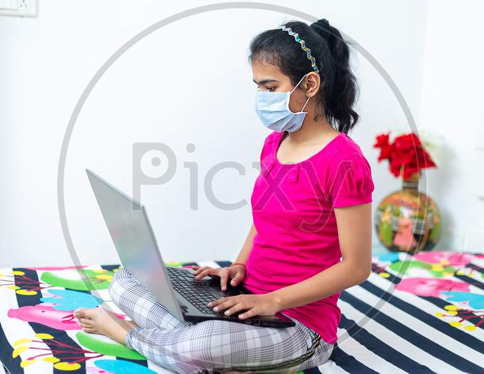 Young Student Watching Lesson Online And Studying From Home. Taking Online Lesson At Home, Social Distance During Quarantine, Self-Isolation, Online Education Concept, Home Schooling,